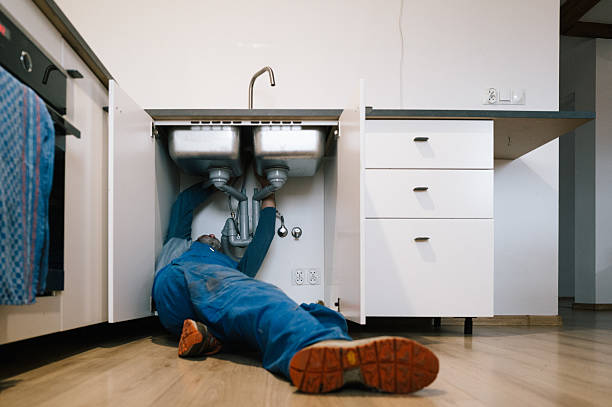 Professional Drain Cleaning technician working in Woodson, IL